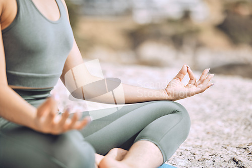 Image of Woman, mudra hands and beach meditation for mental health, chakra balance or mind wellness. Zoom, zen or calm yogi in lotus pose, peace or holistic energy mindset training in nature earth environment