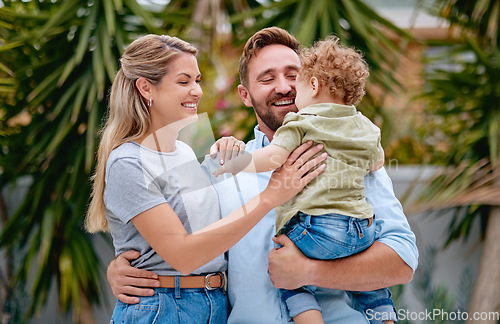 Image of Family, love and parents with child in garden with smile, happy and hug together in summer. Excited, relax and loving mother and father on outdoor holiday with a kid in a park, nature or backyard