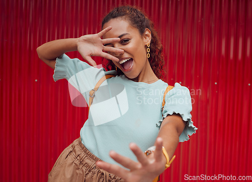 Image of Fashion, travel and happy black woman model feeling happy and playful with style. Portrait of a person from New York with happiness and fun expression feeling young with a smile and hand gesture