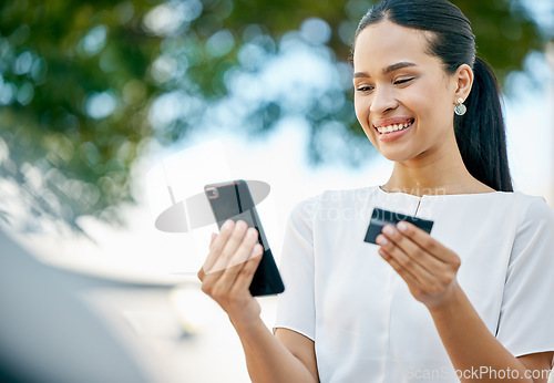 Image of Woman, phone and credit card for ecommerce, online shopping or transaction in the outdoors. Happy female with smile for internet banking, 5G or fintech app purchase on mobile smartphone technology