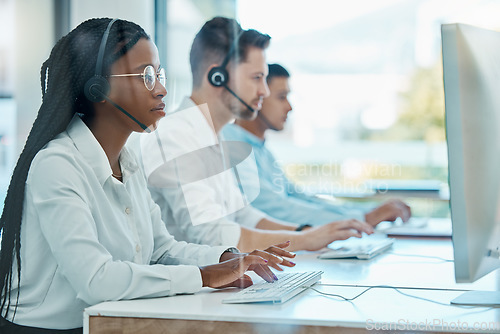 Image of Contact us, telemarketing and crm, black woman at computer in customer service team with headset. Help desk, call center agent or sales consultant, advisory support and consulting online in office.