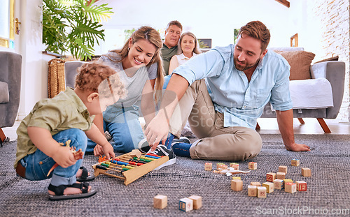 Image of Parents, learning and child playing with toys for education and development at home. Motor skills, childhood education and little boy playing with abacus with mother and father for bonding and care