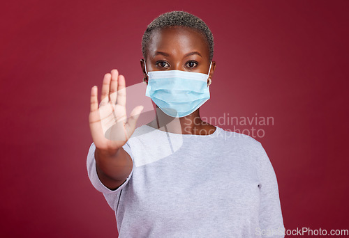 Image of Covid, stop and healthcare with hands of black woman for safety, healthcare and global pandemic. Warning, caution and risk sign with portrait of girl for attention to virus, danger and sick