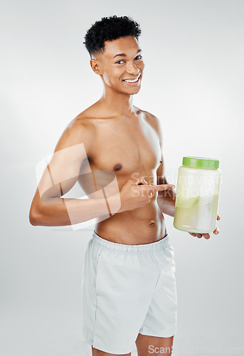 Image of Black man, protein powder and health for fitness, exercise and training workout. Portrait of a happy model from Africa feeling healthy with sport and excited motivation smile about to start sports