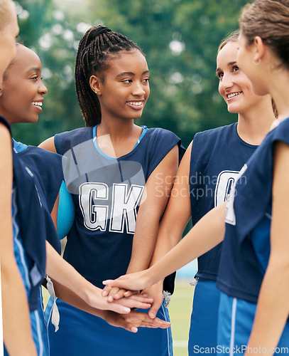 Image of Support, teamwork and sports with netball women for motivation, planning and training on field. Happy, vision and goals with diversity of friends hands in outdoor park for games, summer and workout