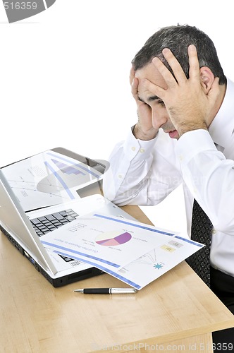 Image of Businessman at his desk on white background