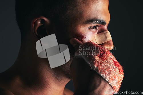 Image of Boxing injury, man and blood on bandage, martial arts fitness and strong with face bruise after match. Professional athlete, exercise and wound, fighter training for active lifestyle and pain.