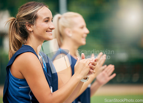 Image of Success, applause and happy netball team in celebration for winning a sports game with teamwork and support. Smile, fitness and healthy women clapping with pride together for a group achievement