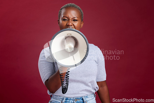 Image of Megaphone, noise and woman in studio for vote, voice and message of change, transformation and democracy on red background. Speaker, black woman and portrait girl speaking protest, strike and opinion