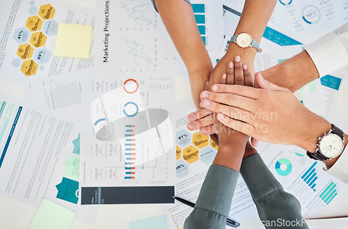 Image of Team hands, marketing collaboration and teamwork support for financial reports in office. Diversity, corporate employee trust and business partnership motivation or goal achievement success at desk