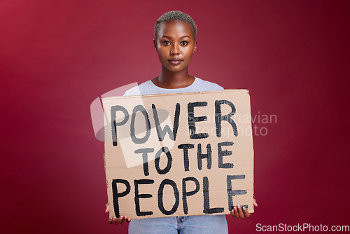 Image of Poster, woman and studio banner power to the people sign by black woman vote, change and empowerment on red background. Portrait, girl and voter message with equality, transformation and human rights