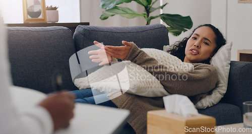 Image of Woman on sofa consulting psychologist for mental health therapy, anxiety and depression in clinic medical office. Depressed, sad and patient talking of problems to therapist for psychology counseling