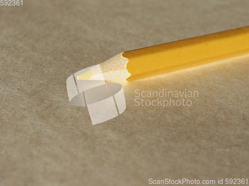 Image of Yellow pencil over paper