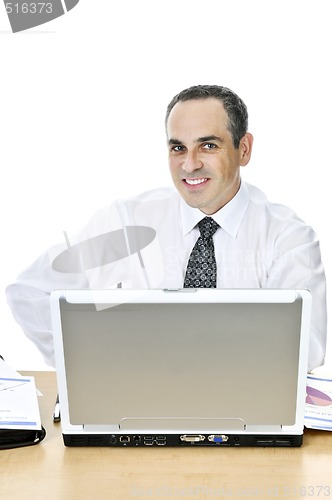 Image of Businessman at his desk on white background