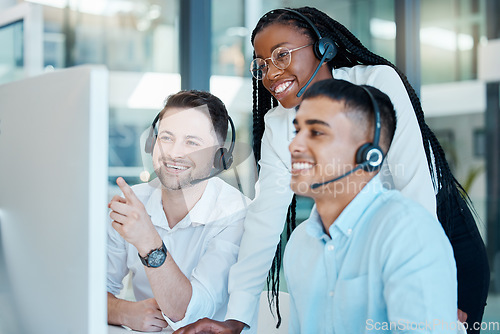 Image of Customer service, call center or telemarketing team and manager or mentor looking happy reading online feedback or sale on website. Diversity in CRM, support and sales consultant training office