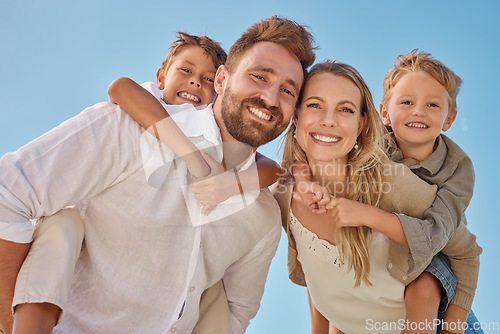 Image of Piggyback, portrait and family in nature, park or field for holiday together in Puerto Rico against a blue sky. Mother, father and happy kids with love, smile and playing on a vacation for adventure