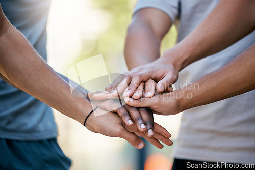 Image of Team building, hands and people in support of goal, mission and collaboration closeup outdoor. Diversity in sport, hand and community by colleagues trust circle for innovation, planning and strategy