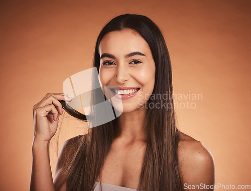 Image of Beauty portrait, skincare and hair care of woman isolated on brown studio background. Wellness, makeup and smile of happy female model from Australia with healthy, long and beautiful silky hair.