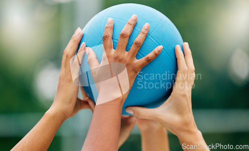 Image of Netball, hands and woman holding a ball during a game for support, teamwork or training together. Sports, community and collaboration for a team of athlete people at a sport event with solidarity