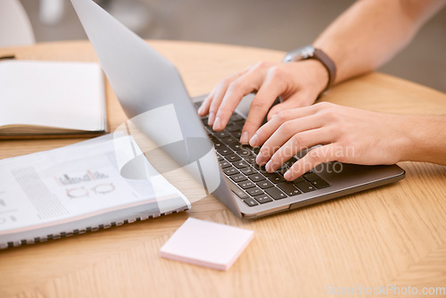 Image of Businessman, hands and laptop typing in office company finance budget, target audience research or digital marketing kpi review. Zoom, creative designer and worker on technology with paper documents