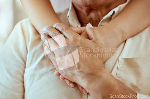 Image of Hands, support and senior man with comfort or help from a caregiver in a retirement home. Retired, empathy and closeup of a nurse comforting an elderly pensioner or patient at a nursing facility.