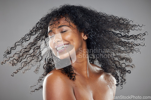 Image of Hair, face and beauty, black woman in skincare and hair care advertising with natural cosmetic and hairstyle in studio background. Volume, curly and shampoo product, hair and skin treatment.