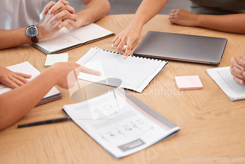 Image of Documents, paperwork and pointing hands in business meeting with papers on desk. Teamwork, collaboration and business people in discussion, planning and working on strategy, analytics and project