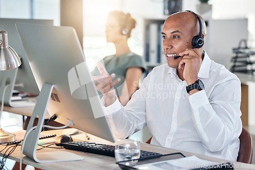 Image of Helpdesk, customer service and male call center agent giving advice to client online using computer. Crm, customer service and consultant or telemarketing agent offering support on pc in agency