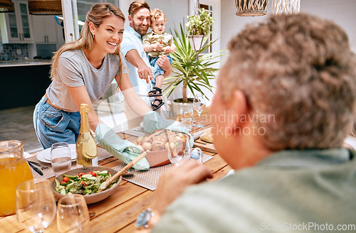 Image of Thanksgiving, celebration and family serving food, having lunch together in family home. Grandparents, parents and child ready to eat turkey on holiday, festival and vacation, celebrating tradition