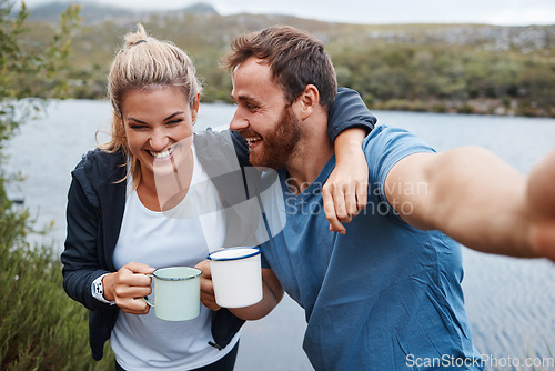 Image of Nature, camping and selfie couple with coffee drink happy with adventure vacation at Mexico lake. Holiday, relax and happiness of people enjoying warm beverage in camper mug photograph.