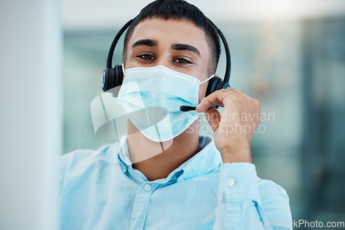 Image of Covid face mask, businessman or call center computer in crm consulting, telemarketing or Indian customer support company. Contact us, consultant or communication worker on tech in covid 19 compliance