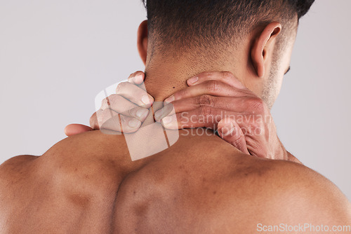 Image of Injury, neck and hands of man in pain feeling muscle tension, inflammation and spine for treatment marketing. Accident, problem and physical trauma of person in grey studio with mockup.