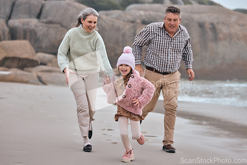 Image of Beach, running and family grandparents with child holding hands for outdoor wellness, energy and development holiday. Happy, excited girl or kid with her grandmother and father run together by sea