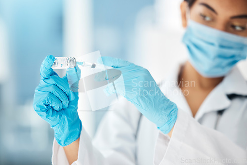 Image of Doctor, mask and vaccine research with needle in hospital or laboratory. Professional healthcare nurse, pharmaceutical vaccination innovation development, corona virus and medical science in lab.