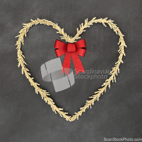 Image of Christmas Tinsel Heart Shape Wreath and Red Bow  