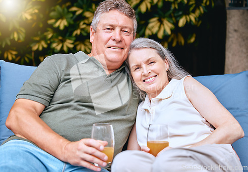 Image of Family, portrait and senior couple with juice on patio, happy and smile while bonding, talking and relax. Love, retirement and elderly man with woman in a garden, hug, relaxing and retired lifestyle