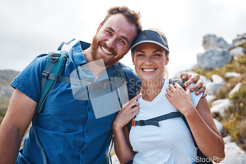Image of Hiking, fitness and love with a couple in the mountains for exercise, adventure or cardio during the day. Nature, health and training with a man and woman walking outdoor on a mountain trail together