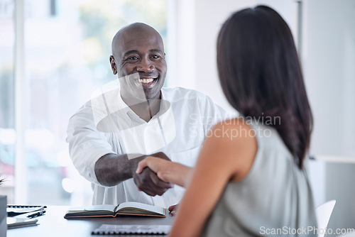 Image of Business people, handshake and meeting for partnership, b2b or collaboration with smile at office. Employee workers shaking hands for business deal, agreement or company recruitment at the workplace