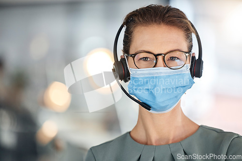 Image of Call center, covid and portrait of woman in mask with headset for consulting in office. Crm, covid 19 compliance and mature sales agent or customer service worker in workplace following health rules.