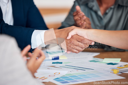 Image of Handshake, deal and partnership merger meeting and paperwork proposal with office hand clap. Agreement, b2b and professional workplace people celebrate company finance opportunity together.