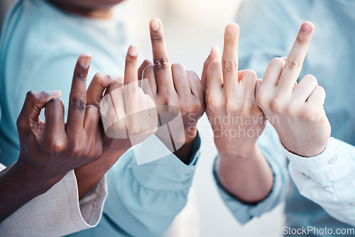 Image of Business people, hand and middle finger with rude, gesture and conflict with disrespect, conflict and opinion. People, finger and hands show sign, icon and fingers with diversity, vote and bad