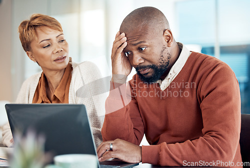 Image of Stress, finance and laptop by senior couple checking budget, savings and expenses while paying bills in kitchen. Anxiety, family and debt by black woman disappointed, annoyed and frustrated with man