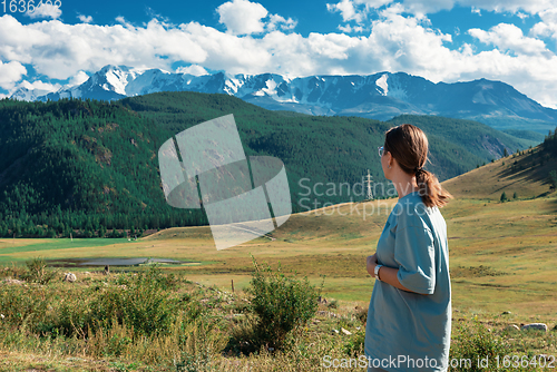 Image of woman in Altai mountains, beauty summer day