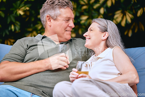 Image of Senior couple, drink and relax while on retirement, love and happy together on vacation and outdoor. Elderly, man and woman enjoy retirement, romantic and care in relationship with relaxing lifestyle