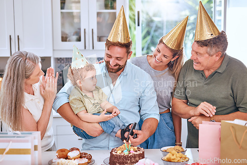 Image of Happy family, cake and happy birthday for a child at a party with a big family in a lovely celebration at home. Excited grandparents, mother and father celebrate a young kids birthday party together