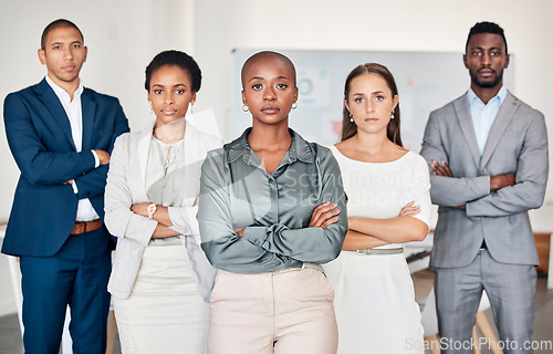 Image of Diversity, leadership and portrait of business people with serious face, arms crossed in office. Teamwork, collaboration and group of men and women in workplace with confidence, power and strength