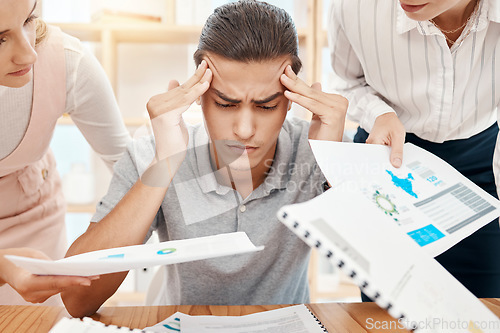 Image of Stress, headache and overwhelmed worker with burnout handed office paperwork by manager and employees. Mental health, anxiety and tired worker stressed or frustrated with note report review deadline