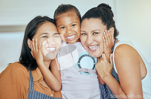 Image of Mother, grandmother and child in apron, hug and cooking together in kitchen, smile in portrait, family and spending quality time. Filipino women hugging girl, happy and generations bonding at home.