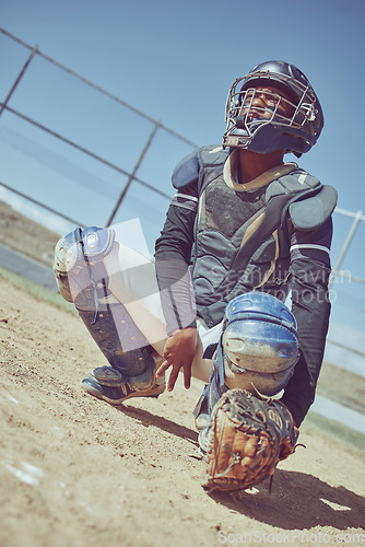 Image of Sports, baseball and catcher ready in a game, match or training on outdoor baseball field. Fitness, exercise and baseball player with focus, concentration and determination to win baseball game