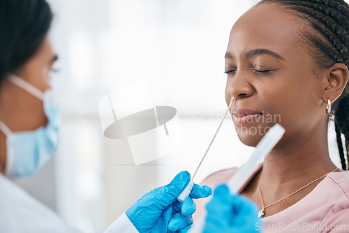 Image of Covid doctor, pcr nose swab and black woman check rapid antigen test in clinic, hospital and assessment service. Sick patient, healthcare and medical analysis of nasal dna for corona virus bacteria